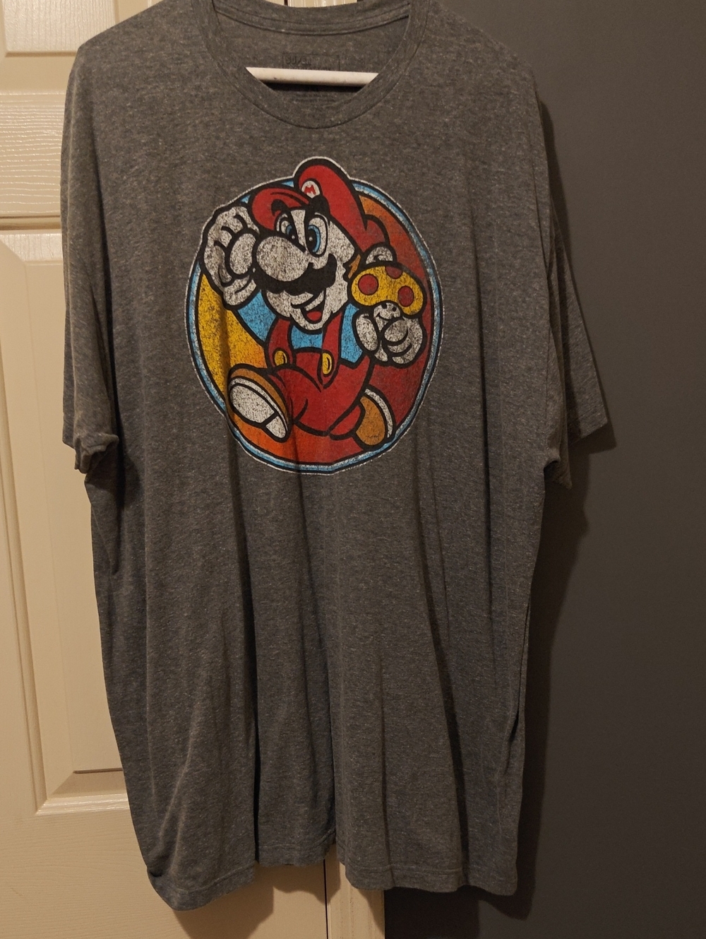 Nintendo Grey Super Mario Chest Graphic Tee with Red, Yellow and Blue Accents